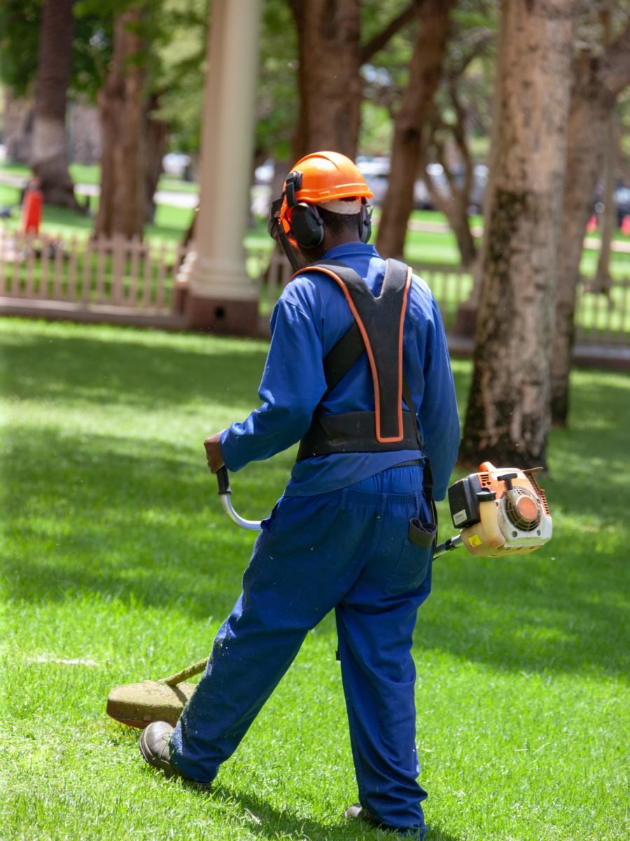 African man with a gasoline cutter gasoline cutter